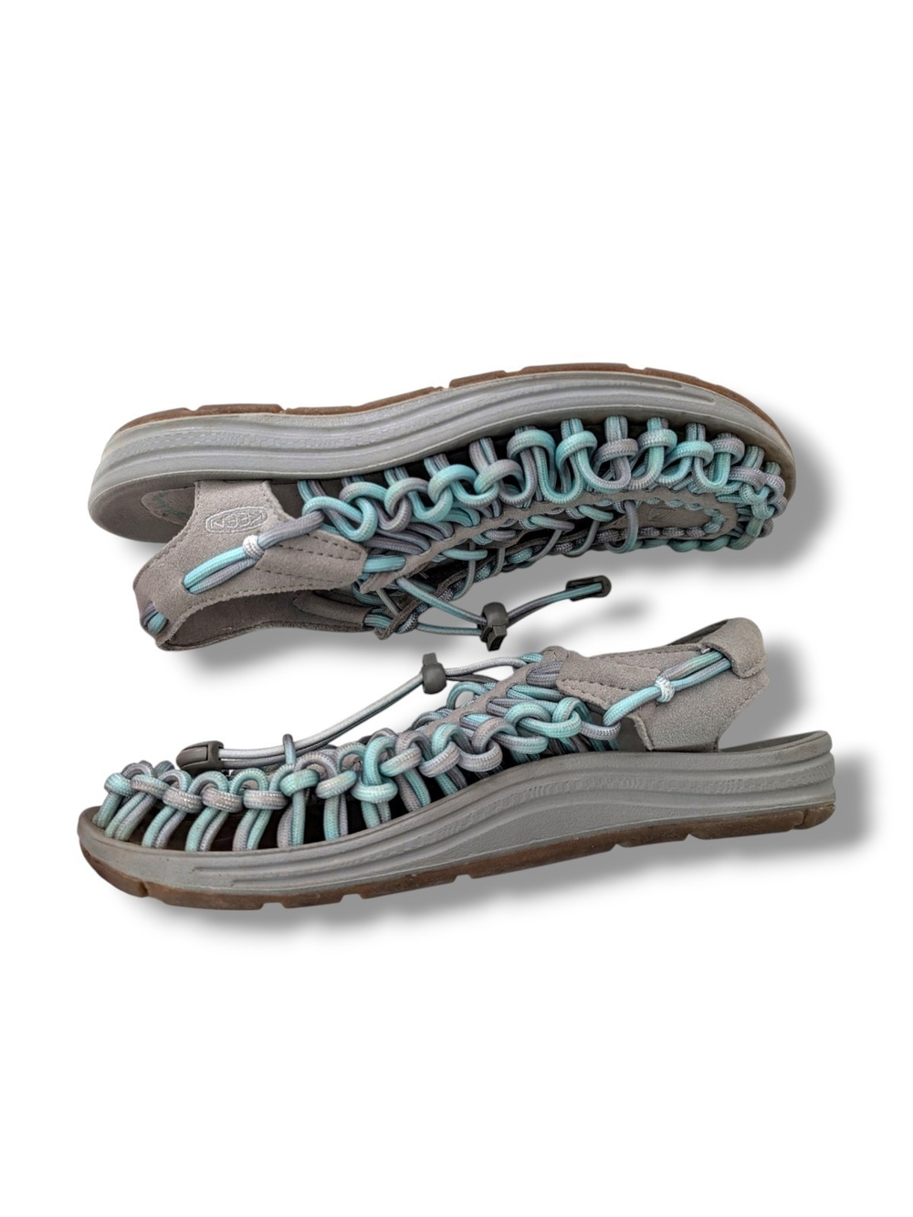 NWOT KEEN Women's Uneek open-air cord sandals in a grey and aqua blue colorway